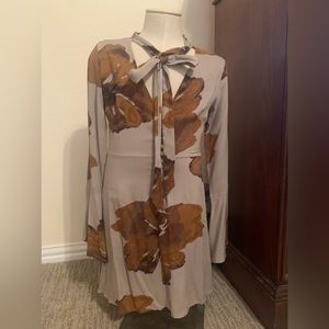 Cute dress worn one time to the graduation. (When I could wear a size 2🥹